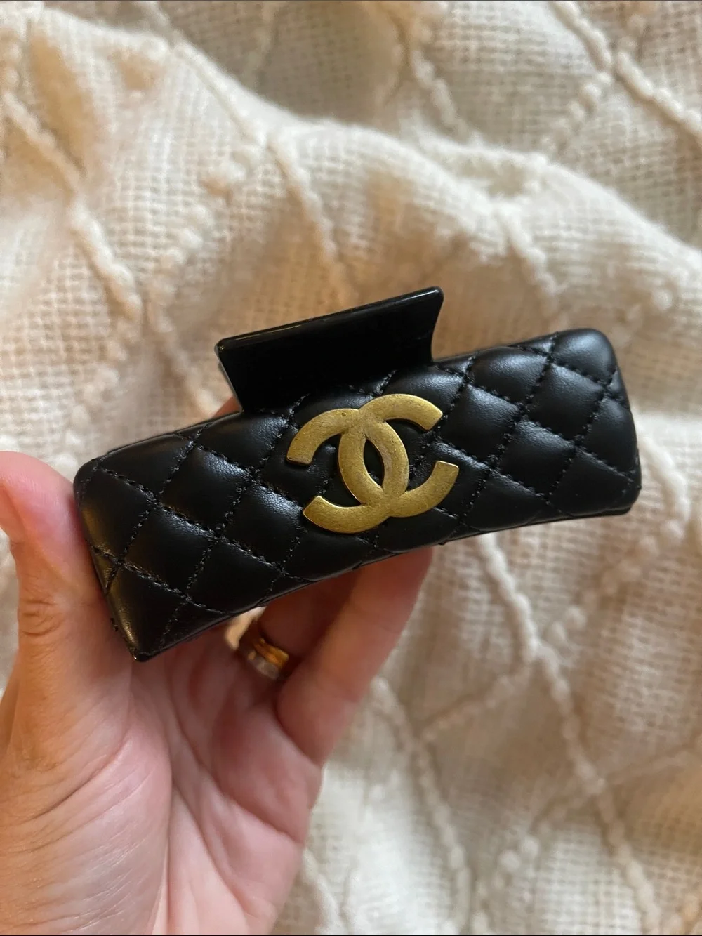 CHANEL Black Quilted Leather Hair Clip with Gold CC Emblem